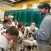 The Fighting Irish's head coach Brian Lemons gives some words of wisdom in the locker room before Saturday afternoons Division 5 state semifinals game against Portland high school.Courtney Sacco I AnnArbor.com 